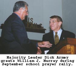Majority Leader Dick Armey greets William J. Murray during September school prayer rally