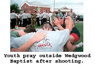 Youth pray outside Wedgwood Baptist after shooting